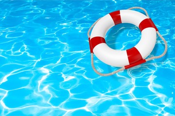 Life preserver floating in a clear pool