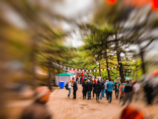 Obraz premium TBILISI, GEORGIA - MAY 12, 2018: Festival of Georgian wine and winemaking in Mtatsminda Park on funicular in Tbilisi, Georgia