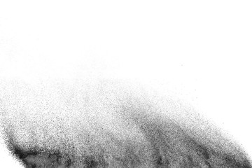 Black powder explosion against white background. Black dust particles splashing.