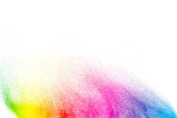 Multicolored powder explosion on white background.