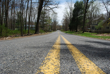 Fototapeta na wymiar Rural Road Perspective Low Angle