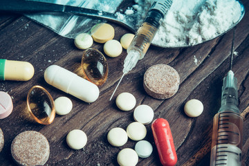 Drug concept. Use illicit Drug abuse .Addiction heroin.Injection, doping. Opium epidemic. Toning, selective focus.