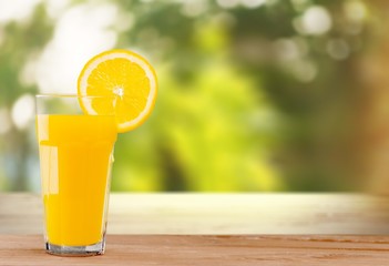 Orange Juice in glass on background