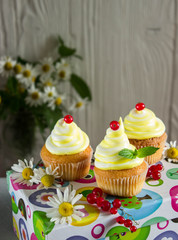 cupcake with cream and berries