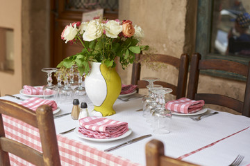 Outdoor tablet set. Restaurant table before lunch opening