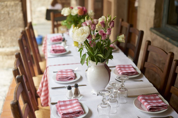 Outdoor tablet set. Restaurant table before lunch opening