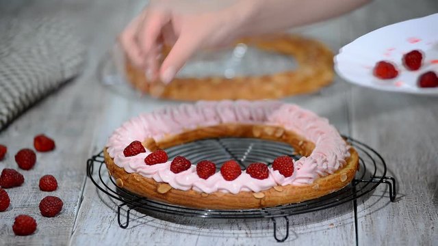 Preparation homemade choux pastry cake Paris Brest. French dessert.