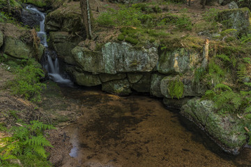 Obraz premium Miluscin waterfall on Bily creek in summer nice morning