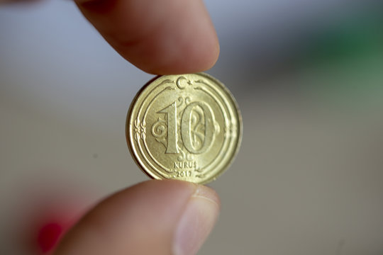 10 Turkish kurus coin 2017 obverse on blurred background