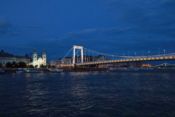 Obraz premium Panoramic views of night bridges through Danube with illumination.