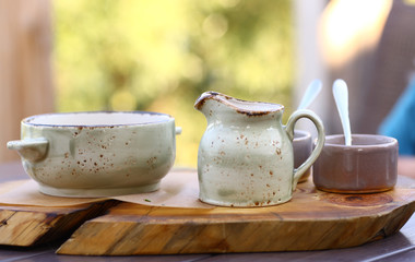 russian cuisine cold soup okroshka - cut potato, egg,meat,greens,cucumber,tomato with kvass and sourcream