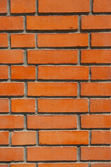 Wall from red bricks background texture abstract