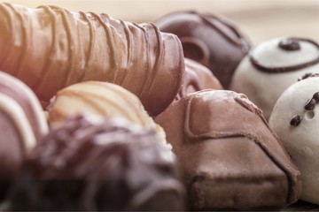 Dark, milk and white chocolate candies