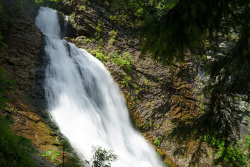 Fototapeta na wymiar Beautiful waterfall in Norway fjords