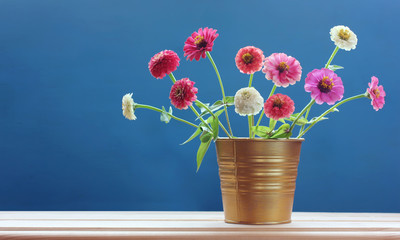 Bouquet of zinnia on the table.