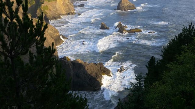 Late evening tilt up of the rocky coast in the Samuel H. Boardman State Scenic Corridor, southern Oregon coast.