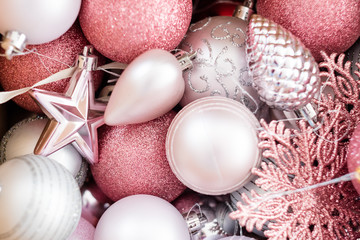 new year festive background. selection of decorative toys balls and snowflakes. glittery holiday...