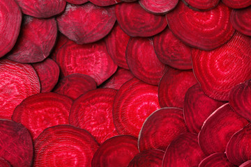 Cut beets as background. Backdrop for design - obrazy, fototapety, plakaty
