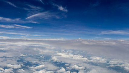 Photo of clouds from above and blue sky