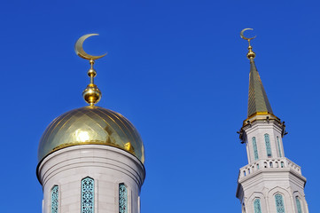 Gilded dome and spire Muslim mosque