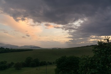 Sunrise and sunset over the hills and town. Slovakia
