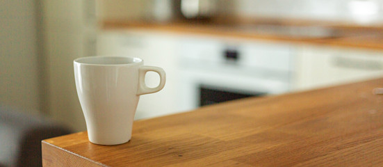 A cup of coffee in the kitchen. Scandinavian style