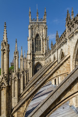 Fototapeta na wymiar Incredible view of the flying buttresses and architectural details of York Minster Cathedral in Yorkshire, England UK.
