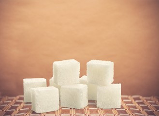 Cubes of sugar on desk