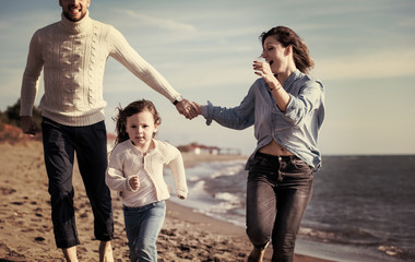 Young family enjoying vecation during autumn