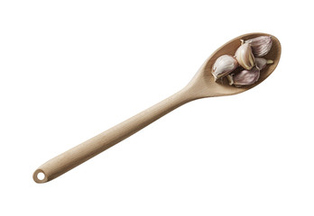 Garlic in wood spoon. Preparing ingredients for cooking. Isolated on white background. Top view.