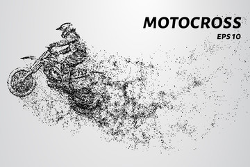 Fototapeta na wymiar Motocross particles. A motorcyclist performs stunts