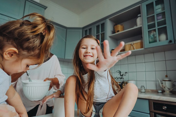 Happy family cook together in the kitchen