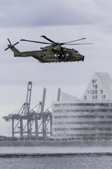 Military Rescue helicopter and modern architecture