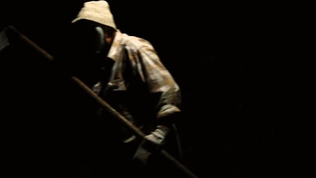 Ghost mime with scythe comes out of darkness on Halloween