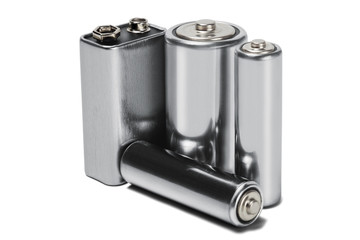 batteries AAA, AA and PP3 on white isolated background. Concept of renewable energy and sources of electrical power. Pattern for designer of environmental power sources, electrical power sources.