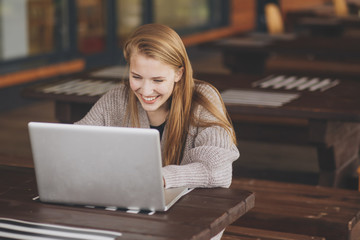 Girl working at her laptop