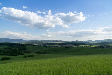 Obraz premium Sunrise and sunset over the hills and town. Slovakia