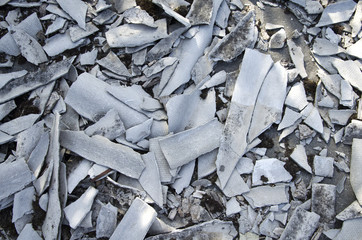 Damaged  asbestos roof panel