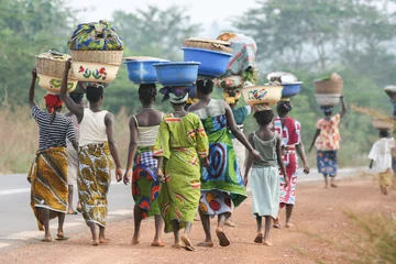 Tuinposter African women carrying bowls on their heads, Benin, Africa © Richard