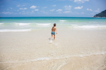 little boy in the sea in Thailand