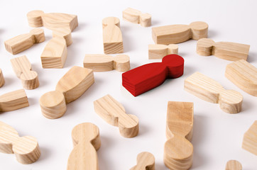 Wooden figures of people are lying on a white background. The search for the second half. Social network. Business. The concept of human resources management. Headhunters. Search for people to work.