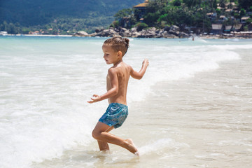 little boy in the sea in Thailand