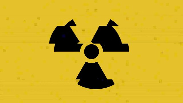 A radiation warning symbol (shown near radioactive materials i.e. nuclear plants, toxic waste dumps), appearing with a heavy digital glitch and noise effect.
