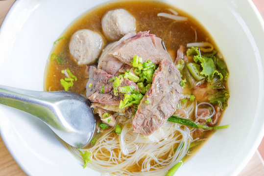 Beef noodles with braised beef and meatball delicious Chinese style Asian favorite Thai street food.