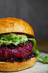 Beetroot and red beans burger in the brioche bun