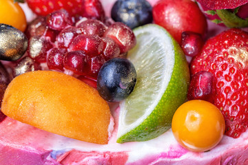 Details of a fruit cake, with flowers, close-up.