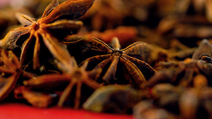 Colorful cooking spices macro closeup. on vintage red wood table, selective focus.