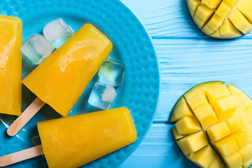 Homemade mango popsicle