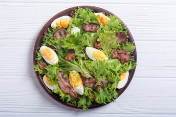 Fresh salad with bacon