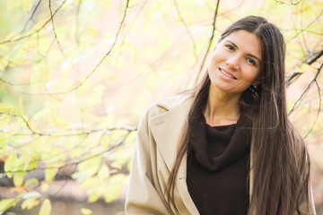 Woman walking in autumn park